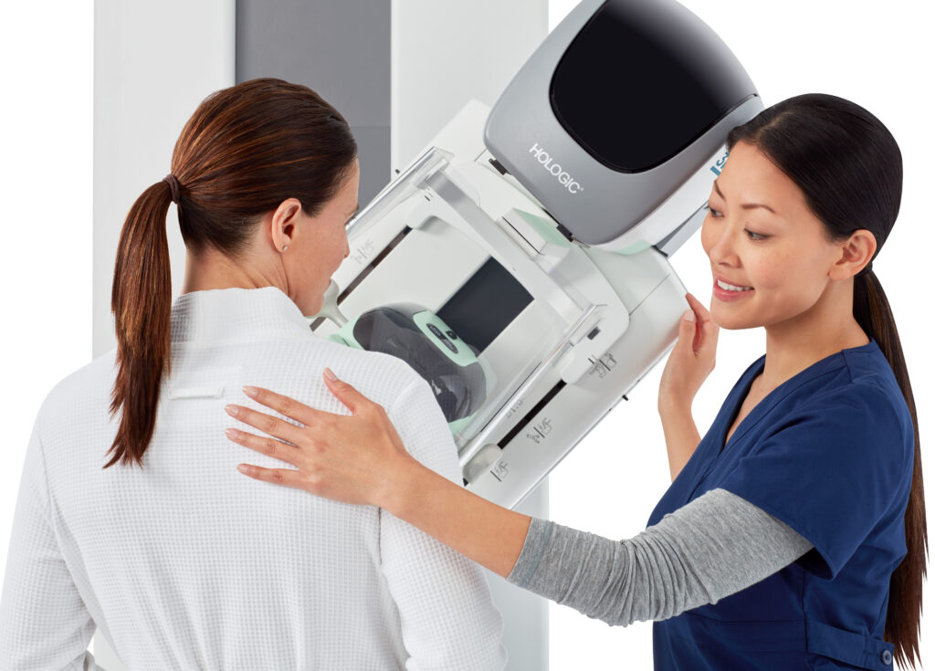 Mammo tech performing mammogram at Jefferson Radiology